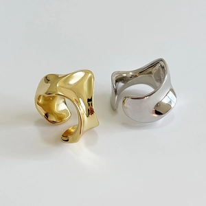Irregular chunky wave open ring in polished gold and silver minimalist metal finish