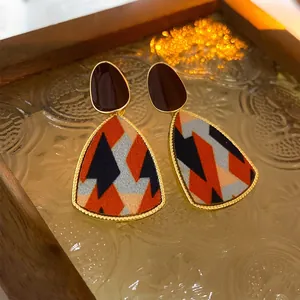 French vintage triangle drop earrings with colorful geometric patterns and gold frames