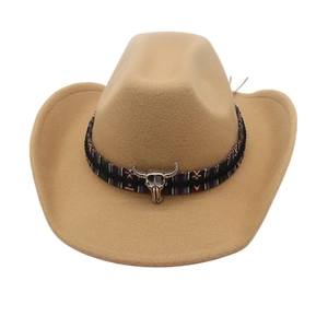 Close-up of khaki felt cowboy hat with ethnic woven band and silver bull skull detail