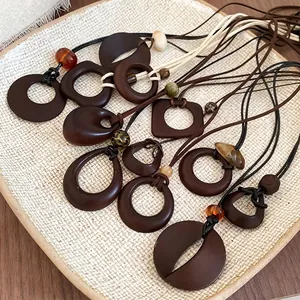 Bohemian geometric resin necklaces with wooden pendants in warm brown earth tones