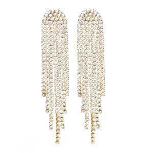 Elegant gold finish long tassel earrings with sparkling white crystals on white backdrop