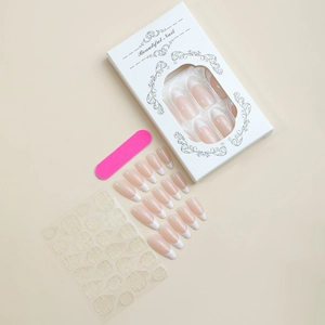 French tip almond press-on nail kit with pink base, file and glue pads in a window box
