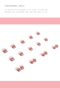 Macro shot of French gradient press-on nails with natural pink and milky white fade effect