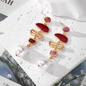 Vintage gold geometric earrings with glitter finish and baroque pearl drops on stone