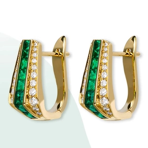 Elegant gold U-shaped huggie earrings with emerald-green stones and micro-pave diamonds