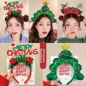 Detail of Christmas headbands with festive trees and Merry Christmas text decor