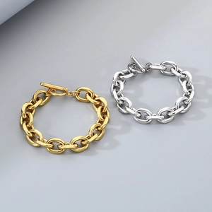 Polished stainless steel Cuban bracelets featuring classic OT buckle in gold and silver
