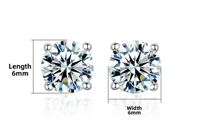 Detail view of 6mm round cubic zirconia stud earrings with classic four-prong silver setting