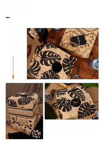 Vintage kraft gift wrapping paper with black tropical leaf patterns and rustic box decor