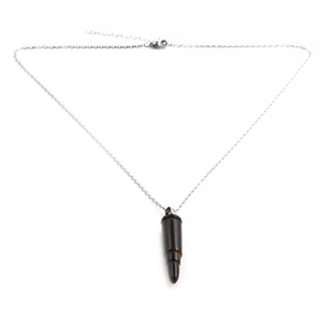 Punk style necklace featuring a tiger eye stone bullet pendant on a silver chain link