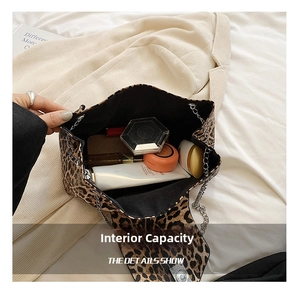 Interior view showing large capacity for cosmetics in leopard print chain handbag