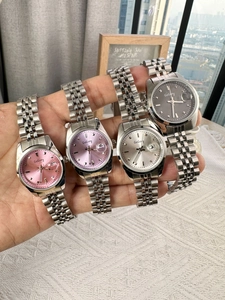 Classic women's metal watch collection with calendar display in four elegant colors