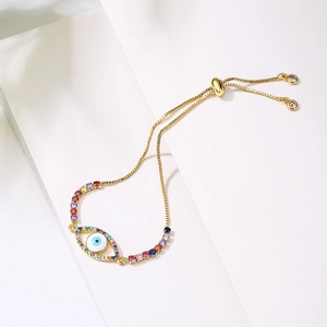 Colorful zircon evil eye charm bracelet in gold finish with adjustable sliding clasp