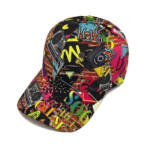 Detail of colorful graffiti baseball cap featuring retro radio and pop art prints