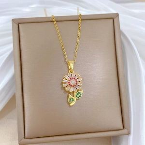 Elegant gold titanium sunflower necklace with colorful zircon petals and red center gem