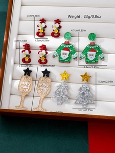 Macro view of 4-pair Christmas earrings set with size and weight info for holiday jewelry