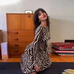 Elegant zebra print long sleeve crew neck maxi dress in a slim fit knit fabric