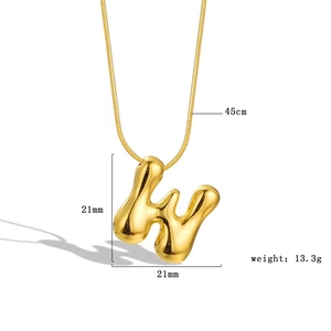 Detail showing dimensions of golden puff alphabet necklace pendant and chain length