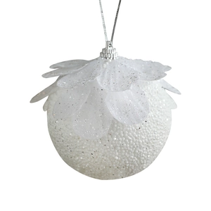 Sparkling white Christmas ball with glitter texture and petal accents on white background