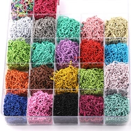 Close-up of organized storage box with twenty-five colors of raffia paper filler material