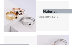 Macro shot of minimalist 316 stainless steel C-shaped bracelets with black enamel inlays