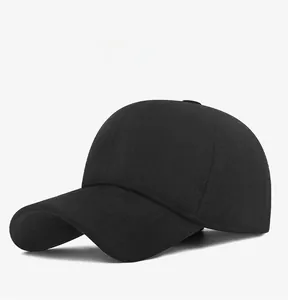 Close-up of black winter baseball cap with textured fabric and square metal side plate