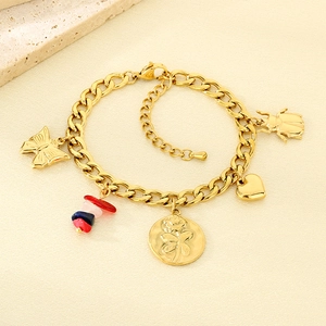 Detail of 18K gold-plated stainless steel bracelet with butterfly and heart charms