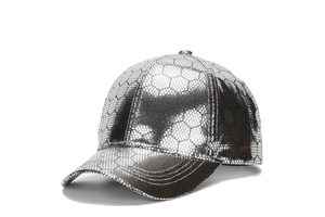 Macro detail of silver PU leather baseball cap with hexagonal honeycomb textured pattern