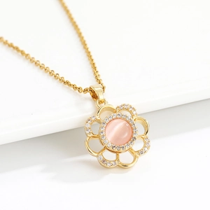 Elegant rotating flower necklace with pink cat eye stone and gold double-layer chain