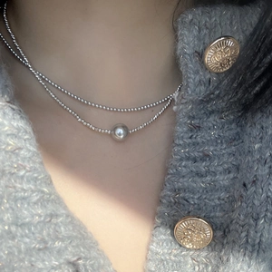 Double-layered stainless steel necklace featuring a minimalist silver bead pendant for women