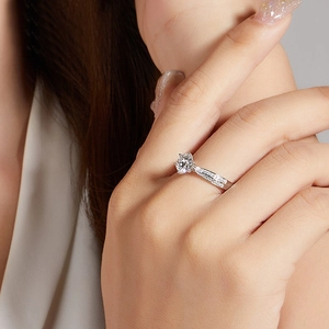 Elegant S925 silver moissanite ring with six-prong round cut stone on a model hand
