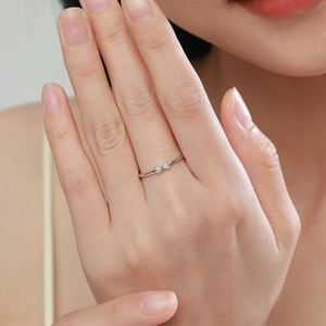 Elegant S925 sterling silver bow ring with micro-set zircon on model's hand