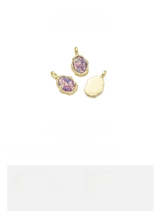Detail view of 13x22mm irregular purple opal pendant with 18K gold plated copper rim