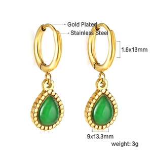Detail of 18k gold plated stainless steel fan earrings with green teardrop stones