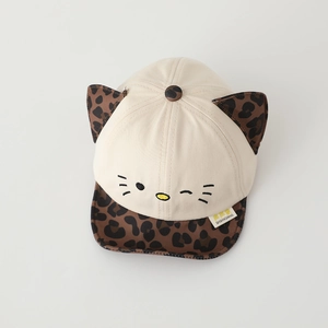 Close-up of baby baseball cap featuring 3D cat ears and leopard print brim detail