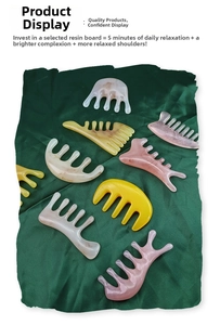 Macro view of multi-colored resin wide-tooth massage combs for head and neck