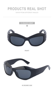 Detail view of steampunk Y2K sports sunglasses with black frames and gray lenses