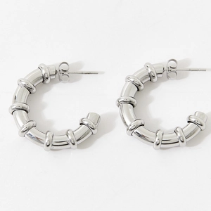 Minimalist silver stainless steel C-shaped bamboo earrings in polished white gold finish