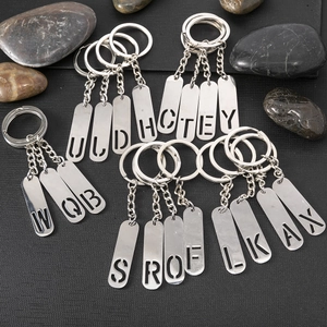 Silver hollow capital letter keychains set made of durable polished stainless steel metal