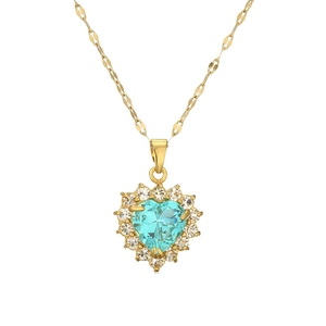 Elegant gold heart pendant necklace with light blue crystal and white cubic zirconia accents