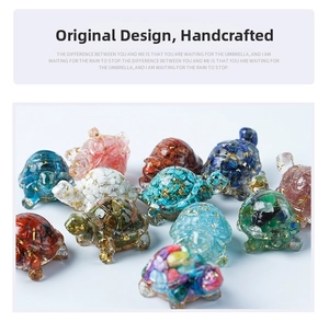 Macro detail of handmade clear resin turtle figurines filled with colorful natural crystal stones
