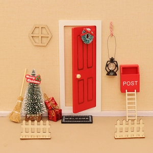 Miniature Christmas dollhouse door set with red wooden door and tiny festive accessories