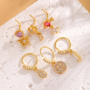 Set of 6 gold plated 18k copper nose studs with butterfly, heart, and zircon details