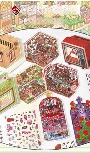 Macro view of detailed miniature house stickers with vintage TV and bakery designs