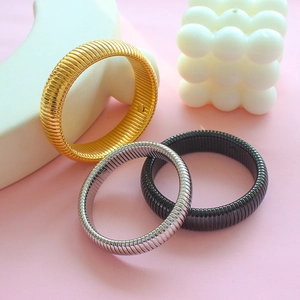 Three-color flexible snake bone stainless steel bracelets in gold, silver, and gun black