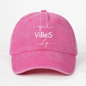 Detailed close-up of Good Vibes Only embroidery on washed cotton baseball cap