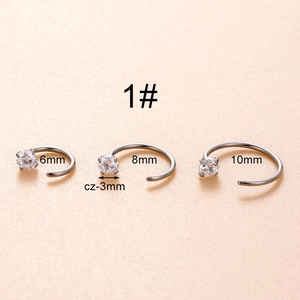 Detailed view of silver stainless steel C-shape nose rings in 6mm, 8mm, and 10mm sizes