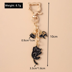 Detailed view of cat paw keychain dimensions and gold-black pendants weight specs