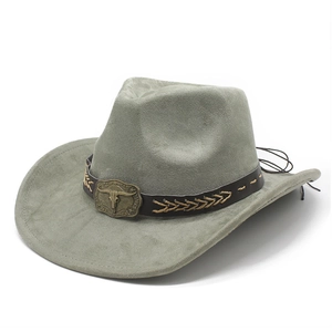 Detail of grey suede cowboy hat featuring brown braided band and bull skull buckle