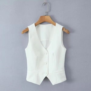Detail view of a white slim fit V-neck suit vest with three buttons and decorative pockets